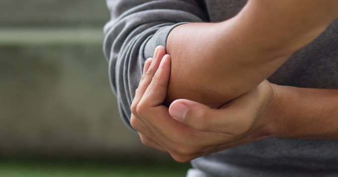 Chiropractic Relief: Acing Tennis Elbow Pain Naturally